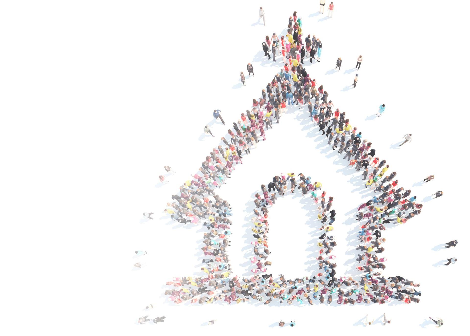 Overhead view of a large group of people in formation of a church.